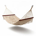 Cotton hammock with wooden spreader bars for indoor and outdoor use